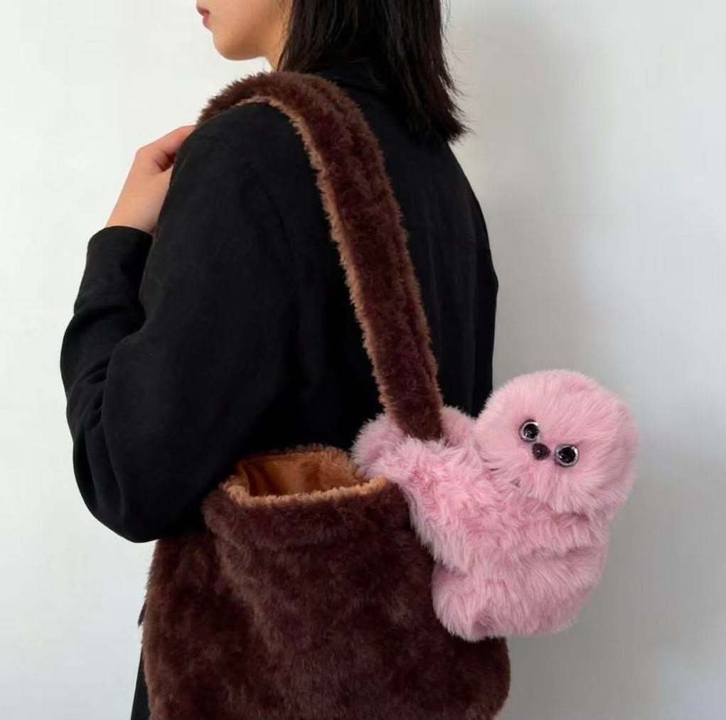 MIMUYU rose – porté avec un sac